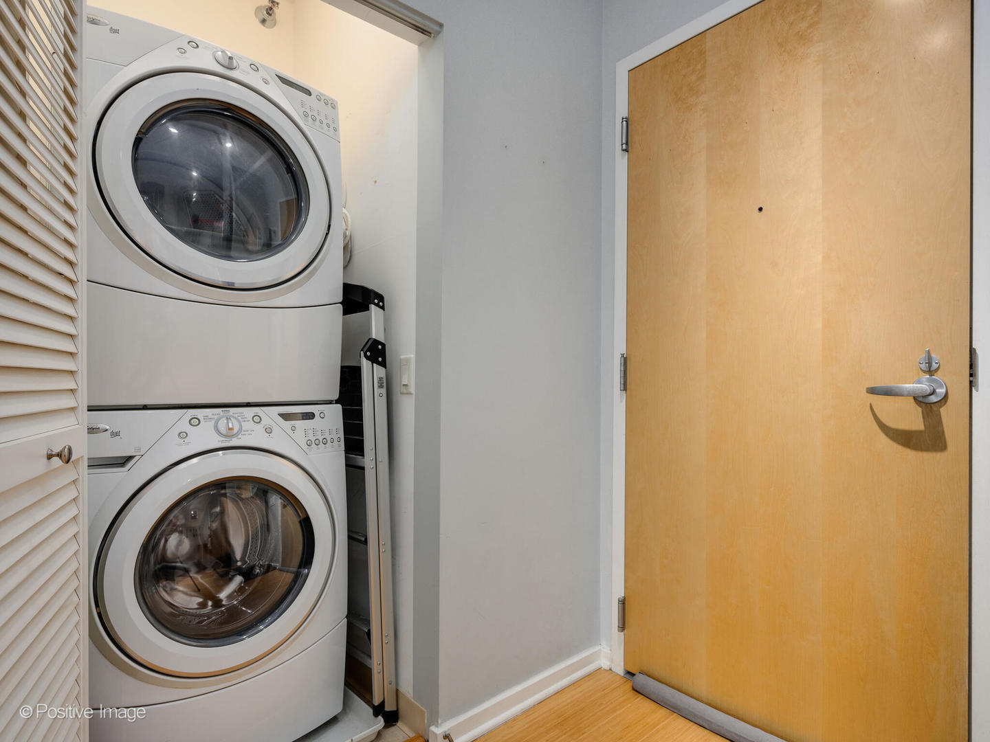 123 South Green Street, Unit 710B Chicago, IL 60607 - Photo 16 of 17 a utility room with dryer and washer