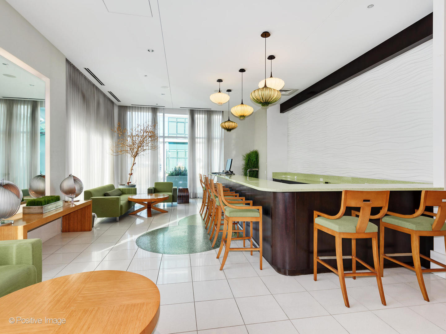 123 South Green Street, Unit 710B Chicago, IL 60607 - Photo 17 of 17 a living room with furniture a chandelier and a dining table