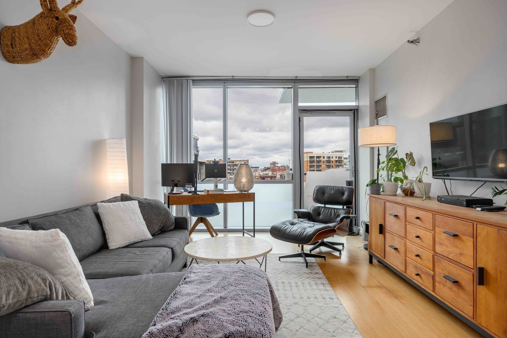 123 South Green Street, Unit 710B Chicago, IL 60607 - Photo 3 of 17 a living room with furniture and a flat screen tv