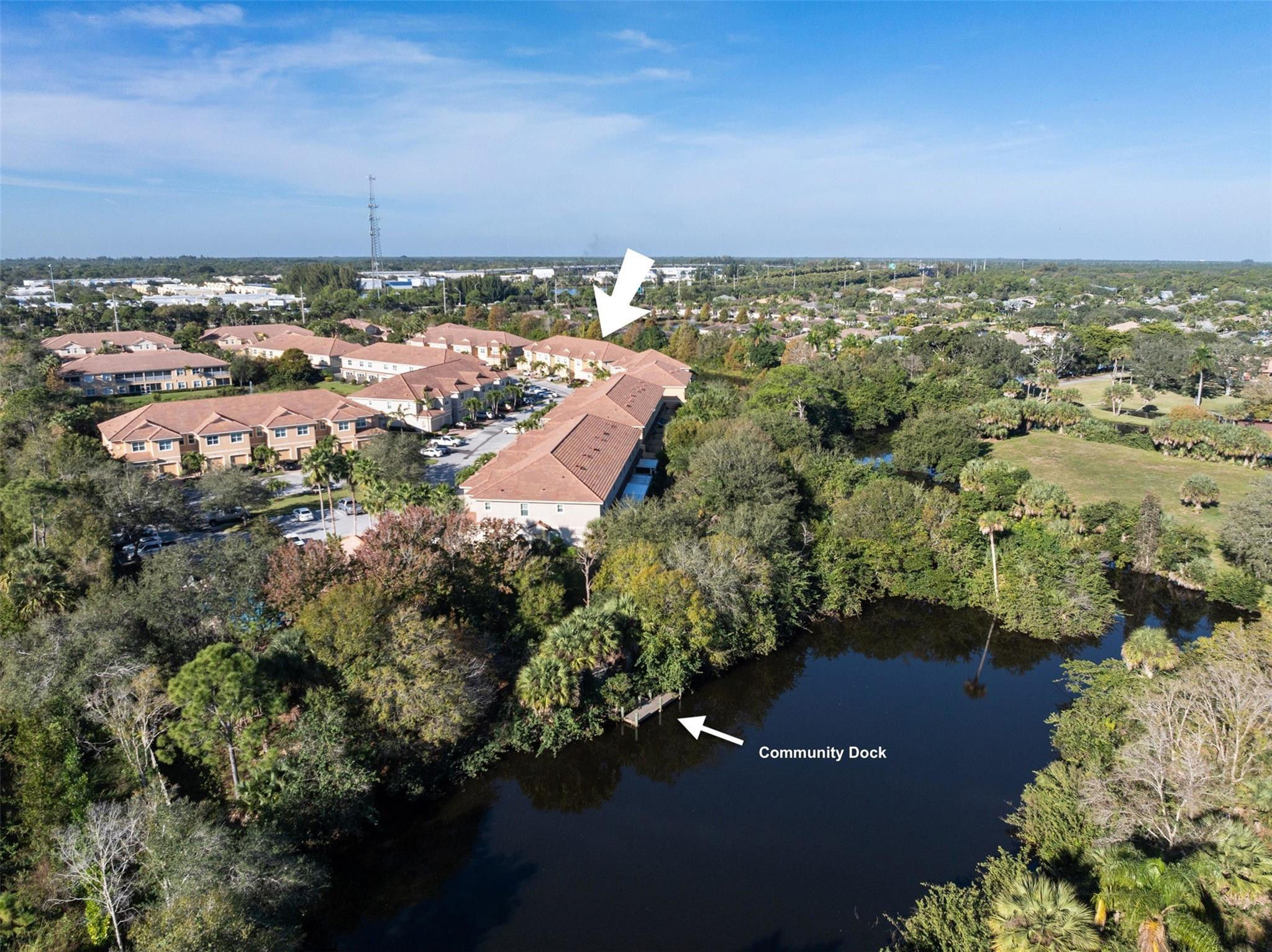 651 Southwest Glen Crest Way, Unit 2 Stuart, FL 34997 - Photo 38 of 41 an aerial view of a city
