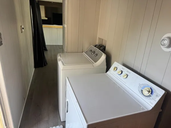 a utility room with dryer and washer