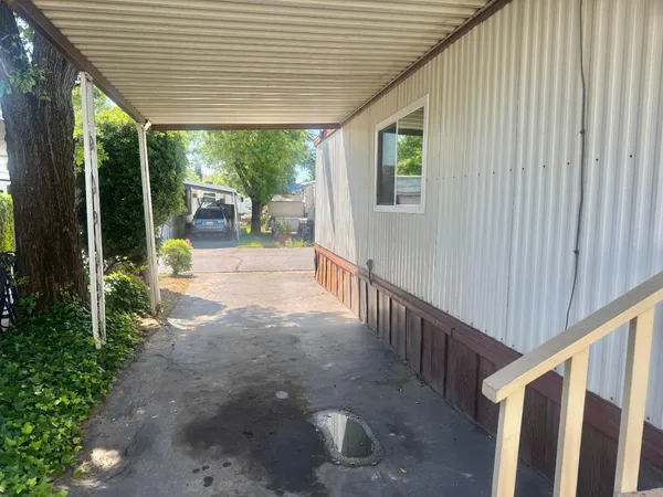 a view of backyard with green space