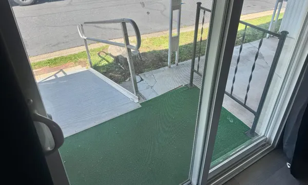 a view of a balcony from a window