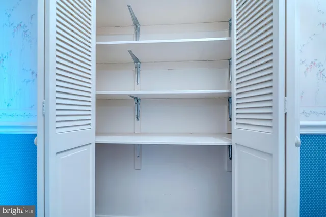 a bathroom with a bathtub sink and a window
