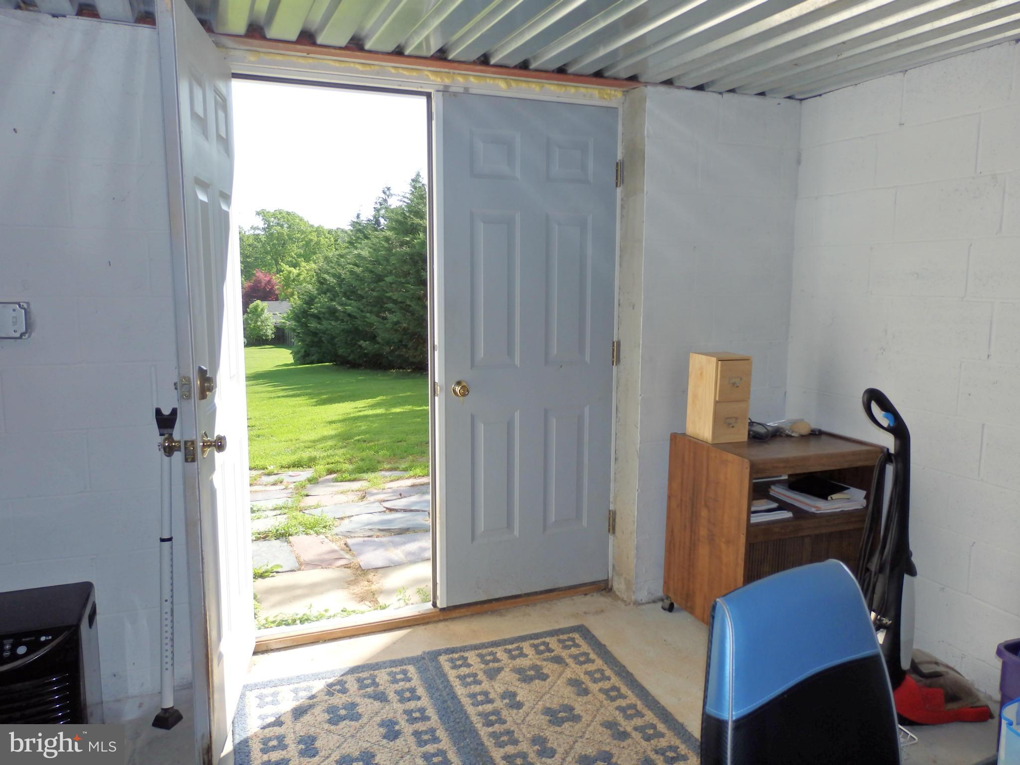 10000 Kelly Road Walkersville, MD 21793 - Photo 26 of 30 Huge storage area has double door walkout to yard