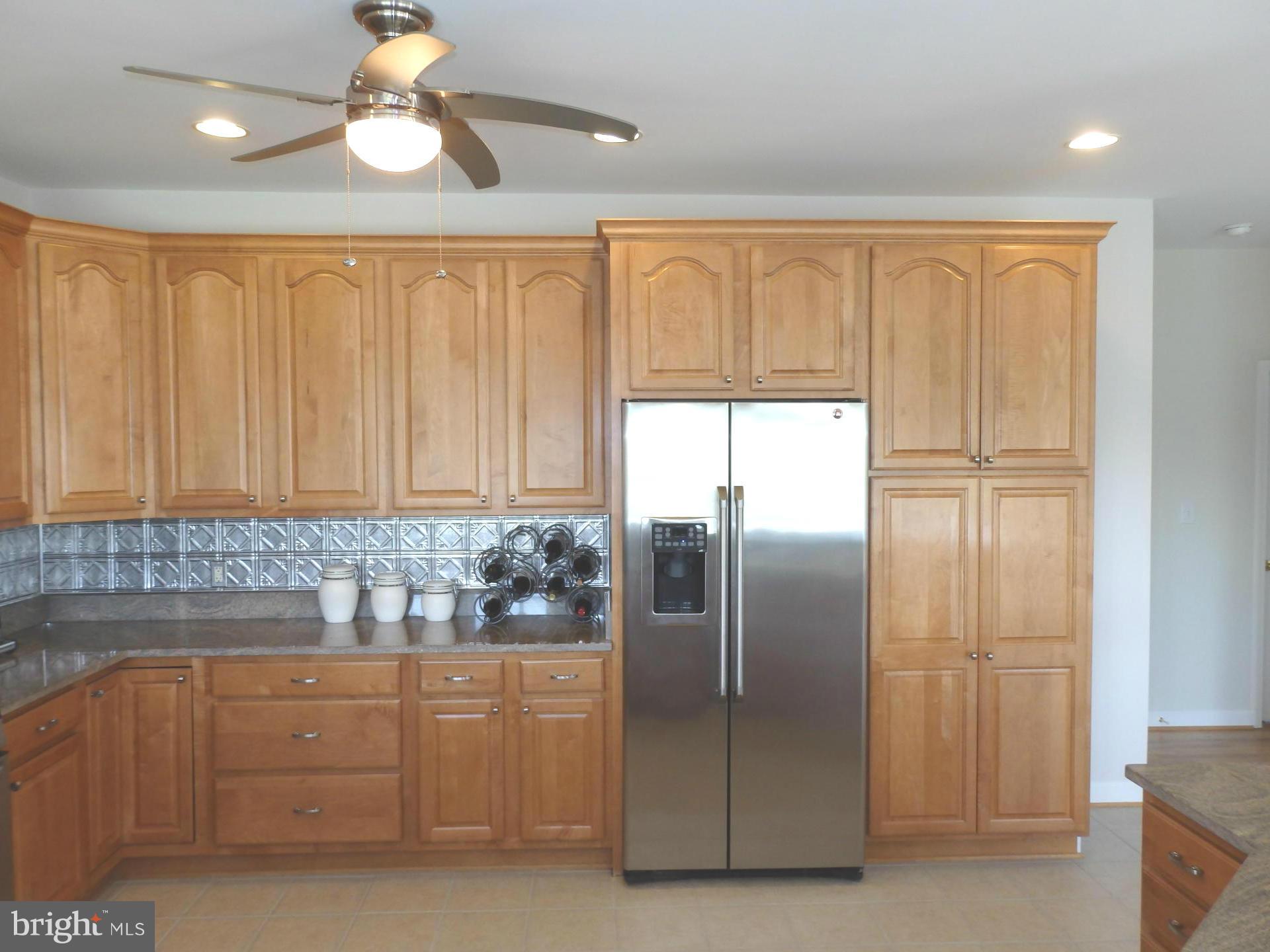 10000 Kelly Road Walkersville, MD 21793 - Photo 8 of 30 Stainless appliances and ceiling fan