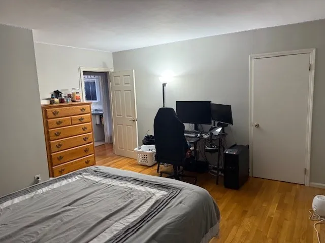 a bedroom with a bed and furniture