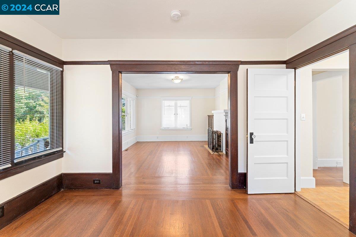 2820 Kelsey Street Berkeley, CA 94705 - Photo 8 of 23 a view of empty room with wooden floor and fan