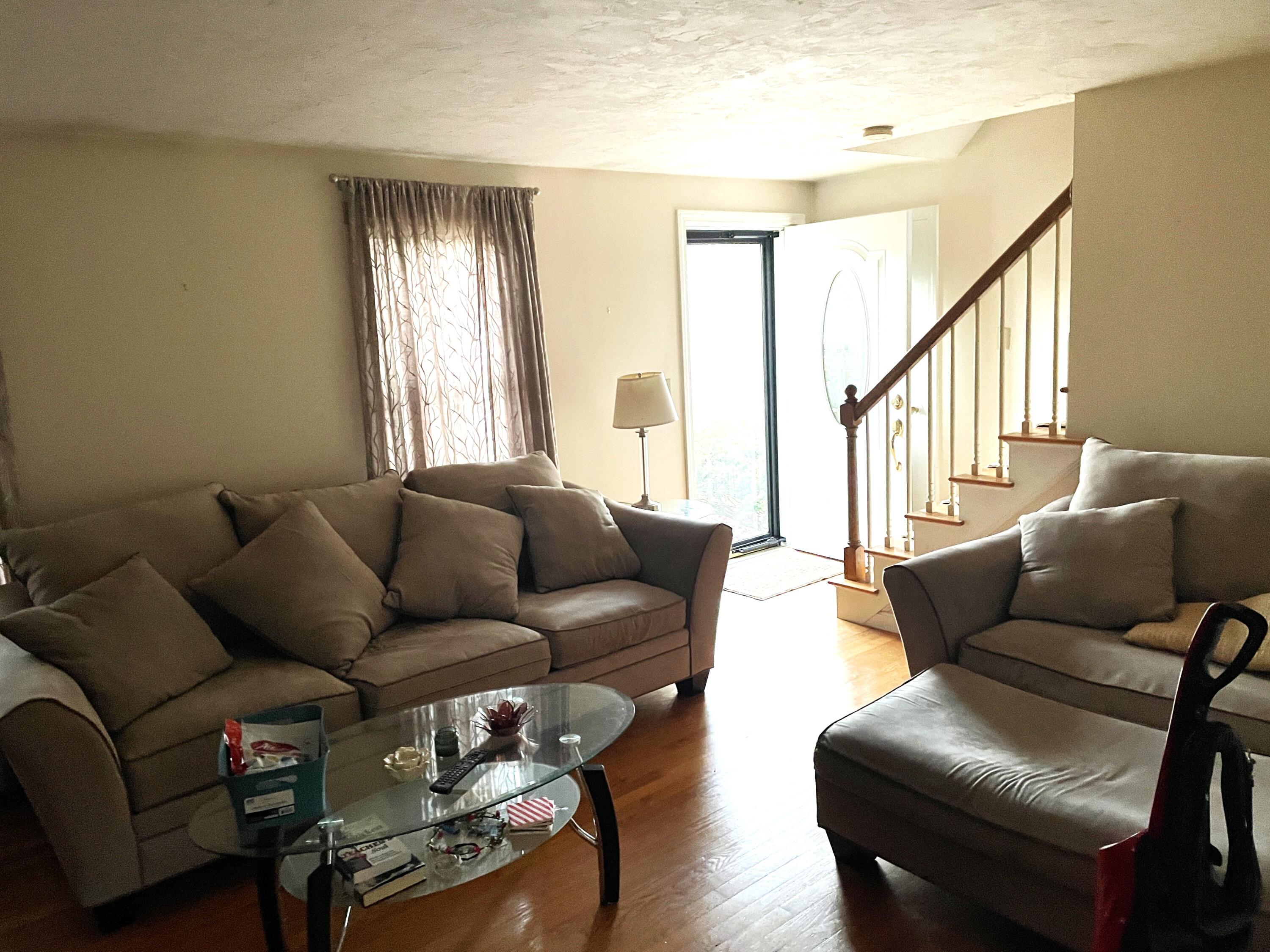 259 Great Marsh Road Centerville, MA 02632 - Photo 5 of 12 a living room with furniture and a window