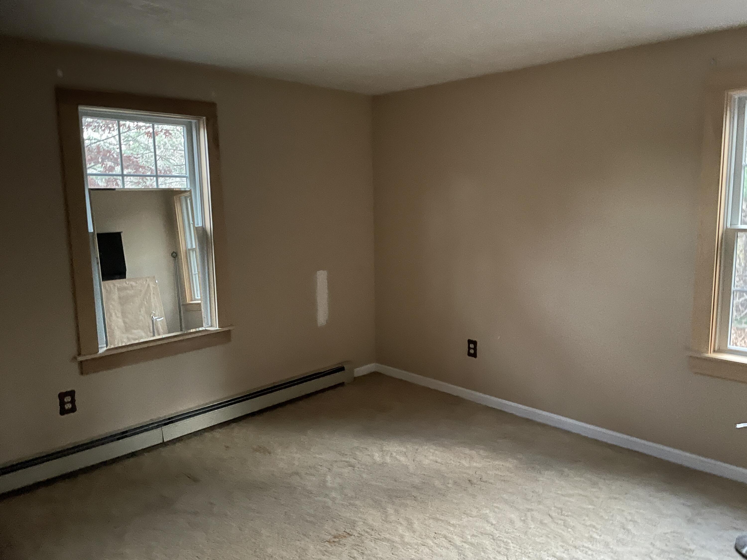 259 Great Marsh Road Centerville, MA 02632 - Photo 6 of 12 an empty room with windows