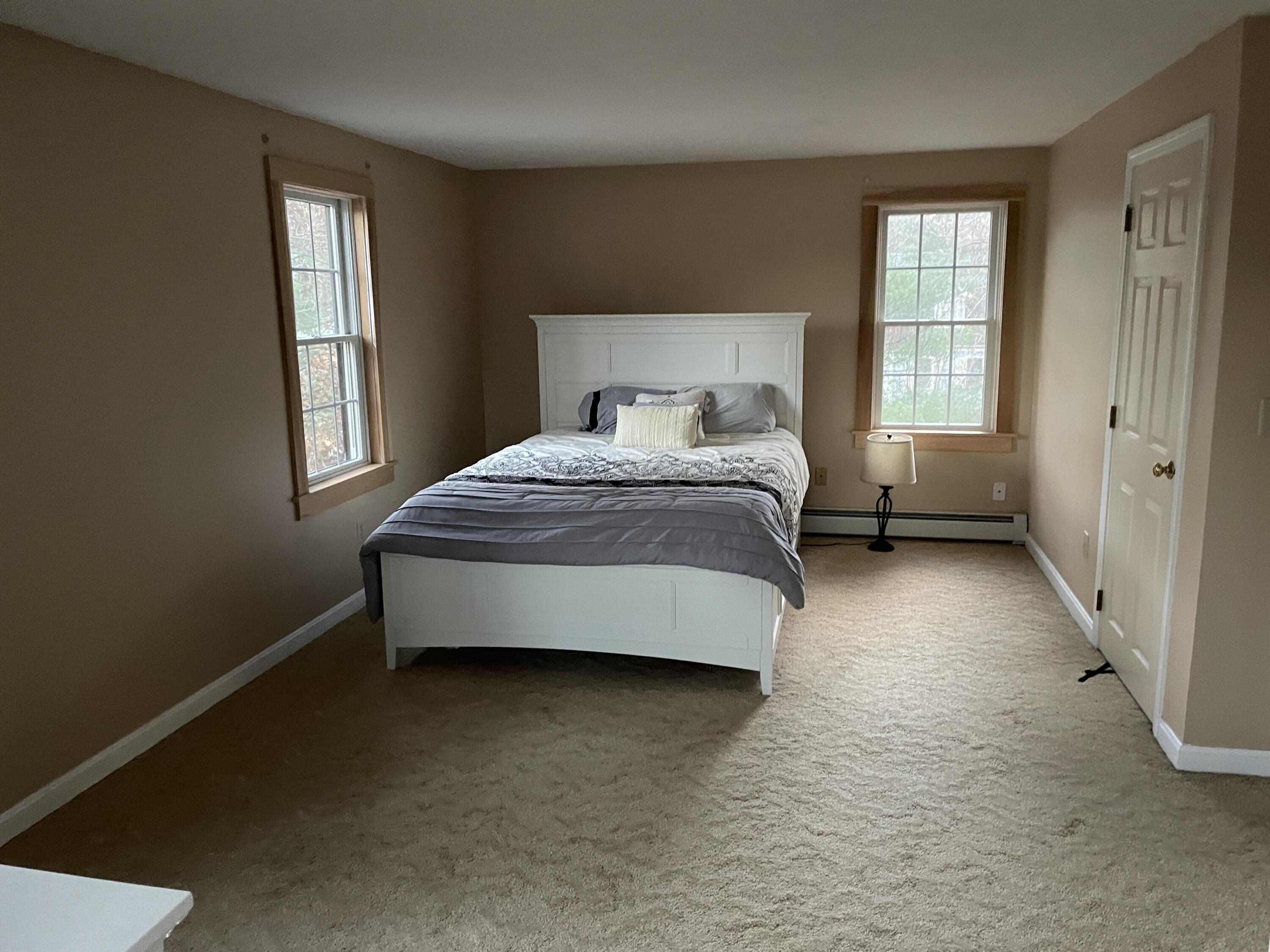 259 Great Marsh Road Centerville, MA 02632 - Photo 7 of 12 a bedroom with a bed and window
