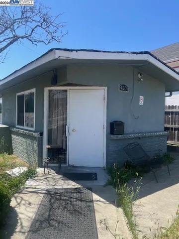 a house view with a outdoor space