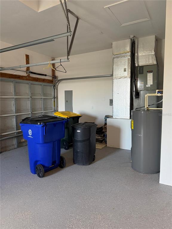 1216 Heavitree Court Sebring, FL 33876 - Photo 34 of 35 a room with furniture and a kitchen