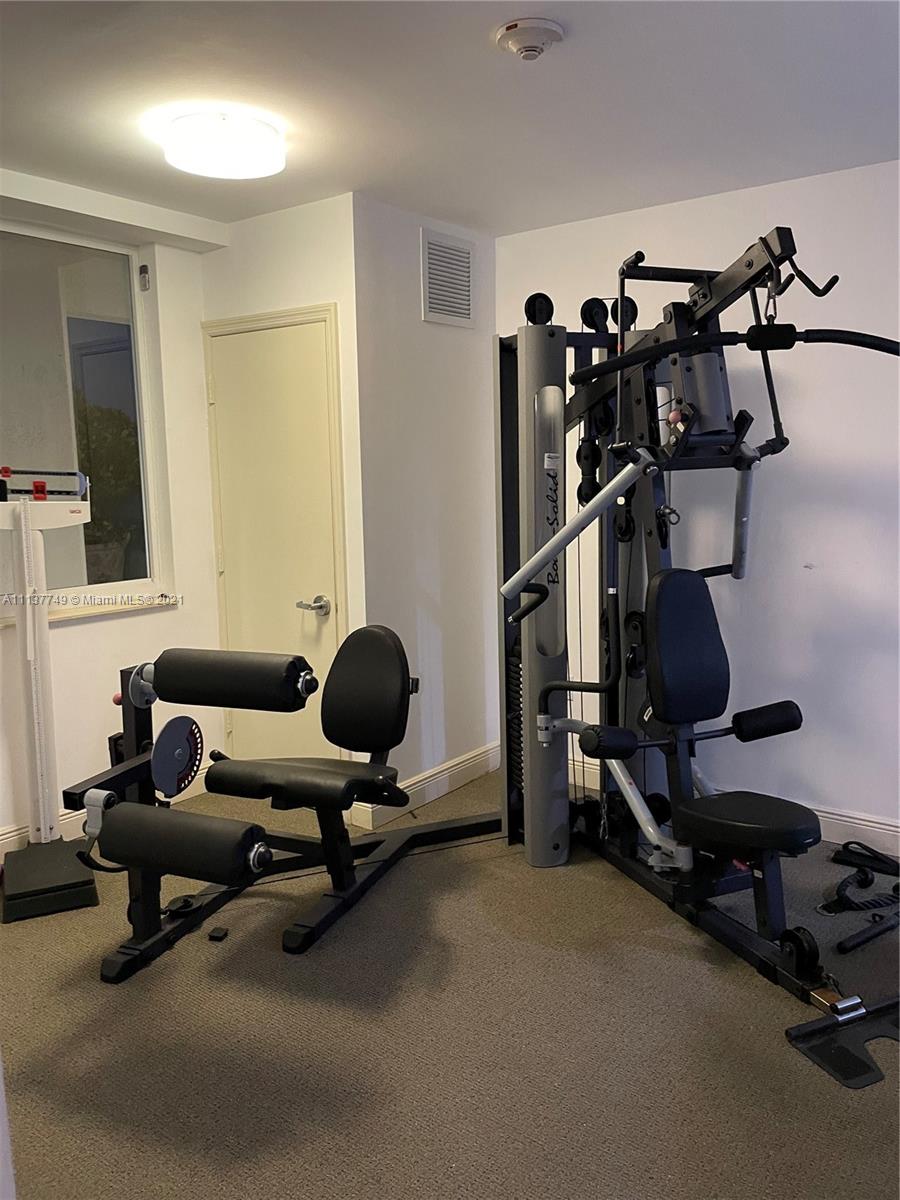 2701 Southwest 3rd Avenue, Unit 202 Miami, FL 33129 - Photo 21 of 26 a view of a room with gym equipment