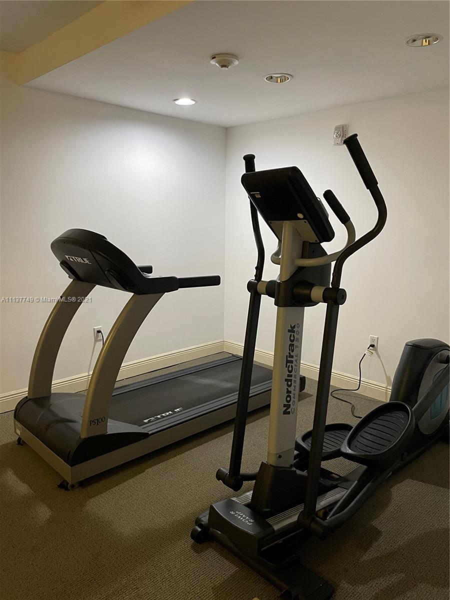 2701 Southwest 3rd Avenue, Unit 202 Miami, FL 33129 - Photo 22 of 26 a view of a room with gym equipment