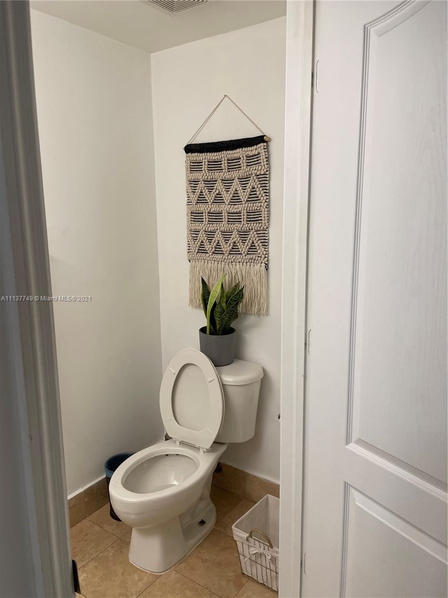 2701 Southwest 3rd Avenue, Unit 202 Miami, FL 33129 - Photo 8 of 26 a close view of a toilet and a sink