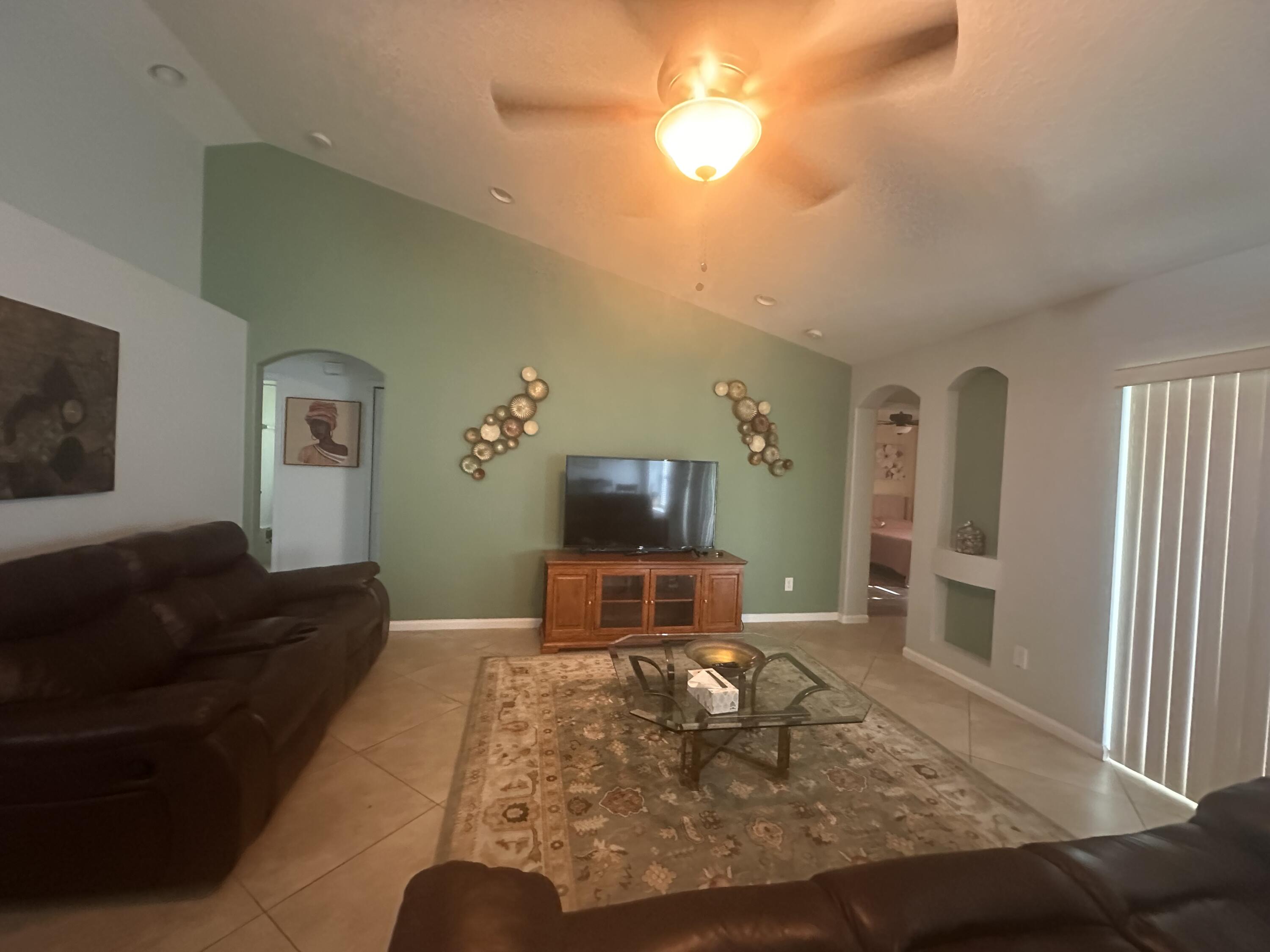 585 Southwest Undallo Road Port St. Lucie, FL 34953 - Photo 11 of 18 Great room