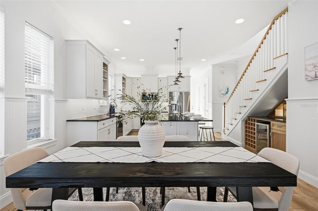 25 Sandy Beach Way Palm Coast, FL 32137 - Photo 11 of 41 a view of a dining room with furniture and wooden floor