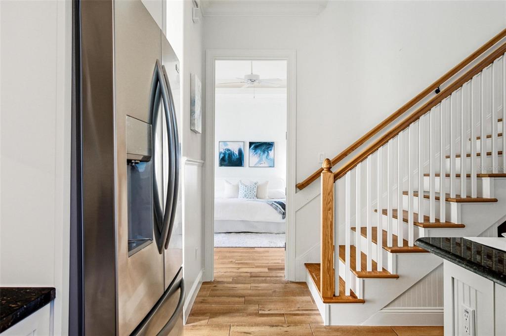 25 Sandy Beach Way Palm Coast, FL 32137 - Photo 15 of 41 a view of staircase with lots of frames on wall and stairs