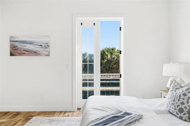 a view of a porch with a floor to ceiling window