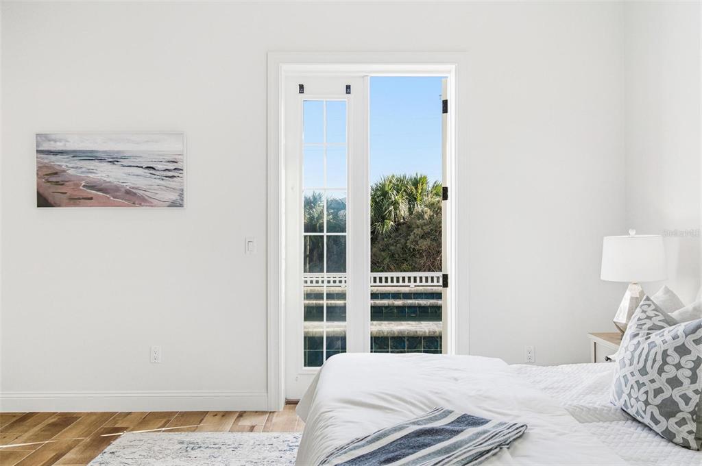 25 Sandy Beach Way Palm Coast, FL 32137 - Photo 21 of 41 a bedroom with a bed and a window