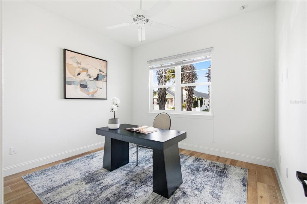 25 Sandy Beach Way Palm Coast, FL 32137 - Photo 24 of 41 a work room with furniture and window