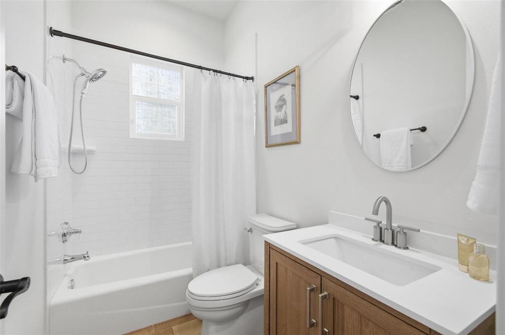 25 Sandy Beach Way Palm Coast, FL 32137 - Photo 25 of 41 a bathroom with a sink toilet and shower