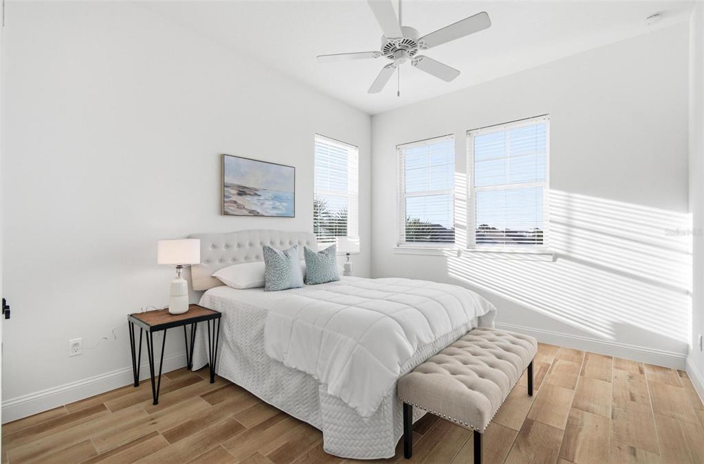 25 Sandy Beach Way Palm Coast, FL 32137 - Photo 32 of 41 a bedroom with a bed and a table