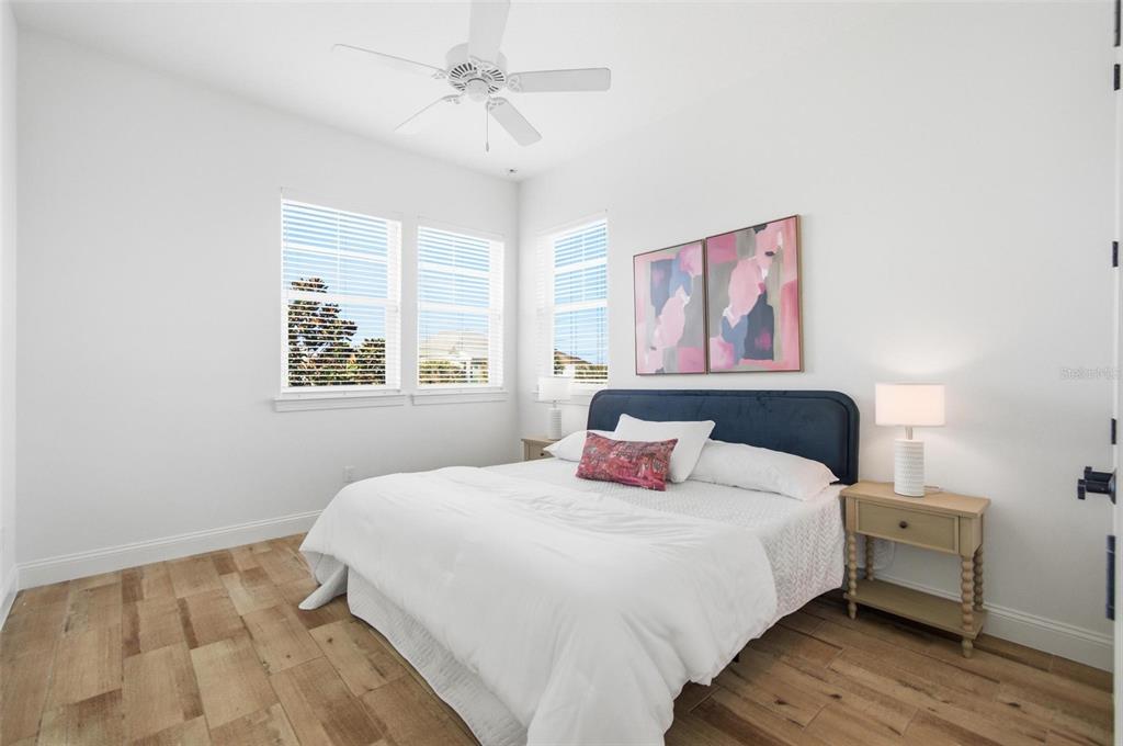 25 Sandy Beach Way Palm Coast, FL 32137 - Photo 34 of 41 a bedroom with a large bed and a window