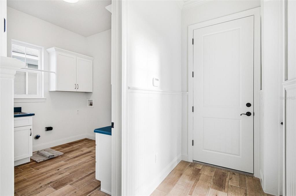 25 Sandy Beach Way Palm Coast, FL 32137 - Photo 38 of 41 a view of kitchen with wooden floor