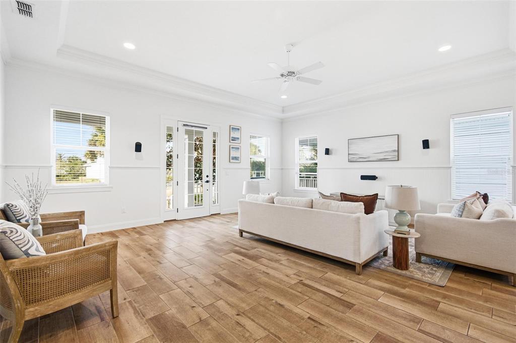 25 Sandy Beach Way Palm Coast, FL 32137 - Photo 6 of 41 a living room with furniture and a large window