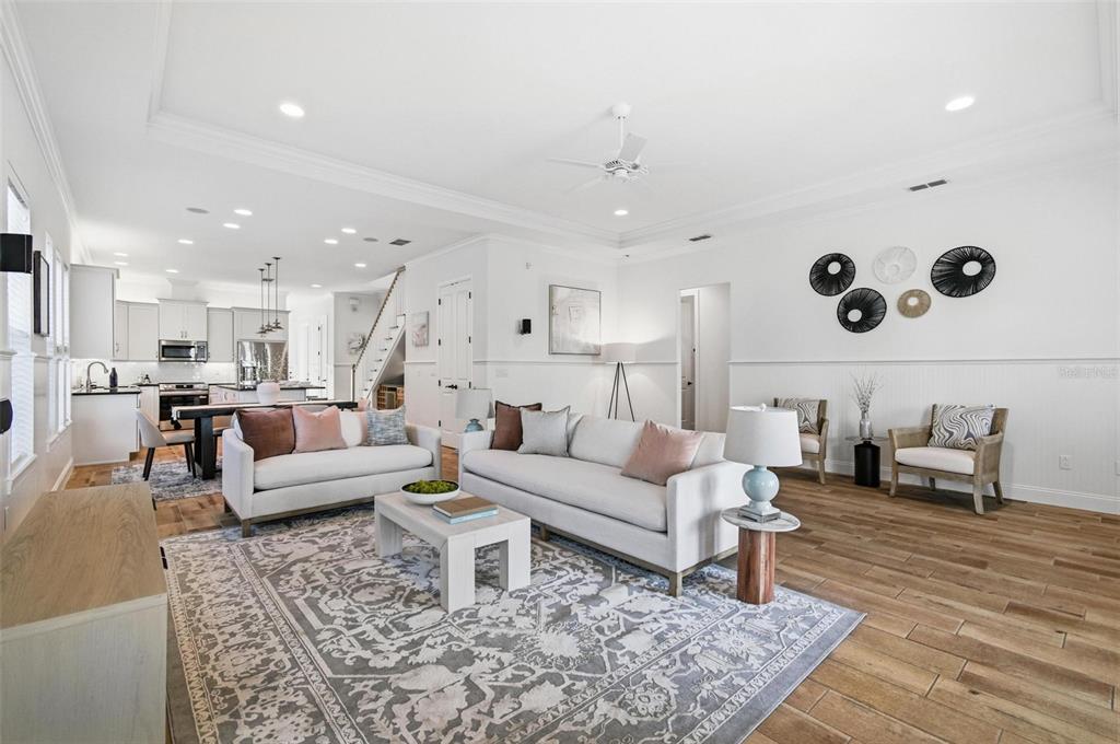 25 Sandy Beach Way Palm Coast, FL 32137 - Photo 8 of 41 a living room with furniture kitchen view and a table