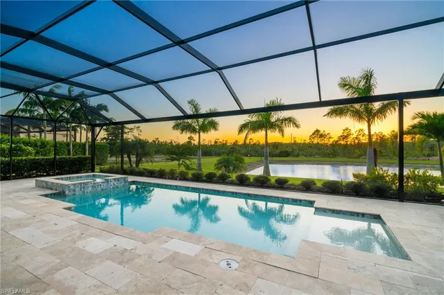 a view of swimming pool with a patio