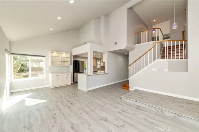 a view of livingroom with furniture and windows
