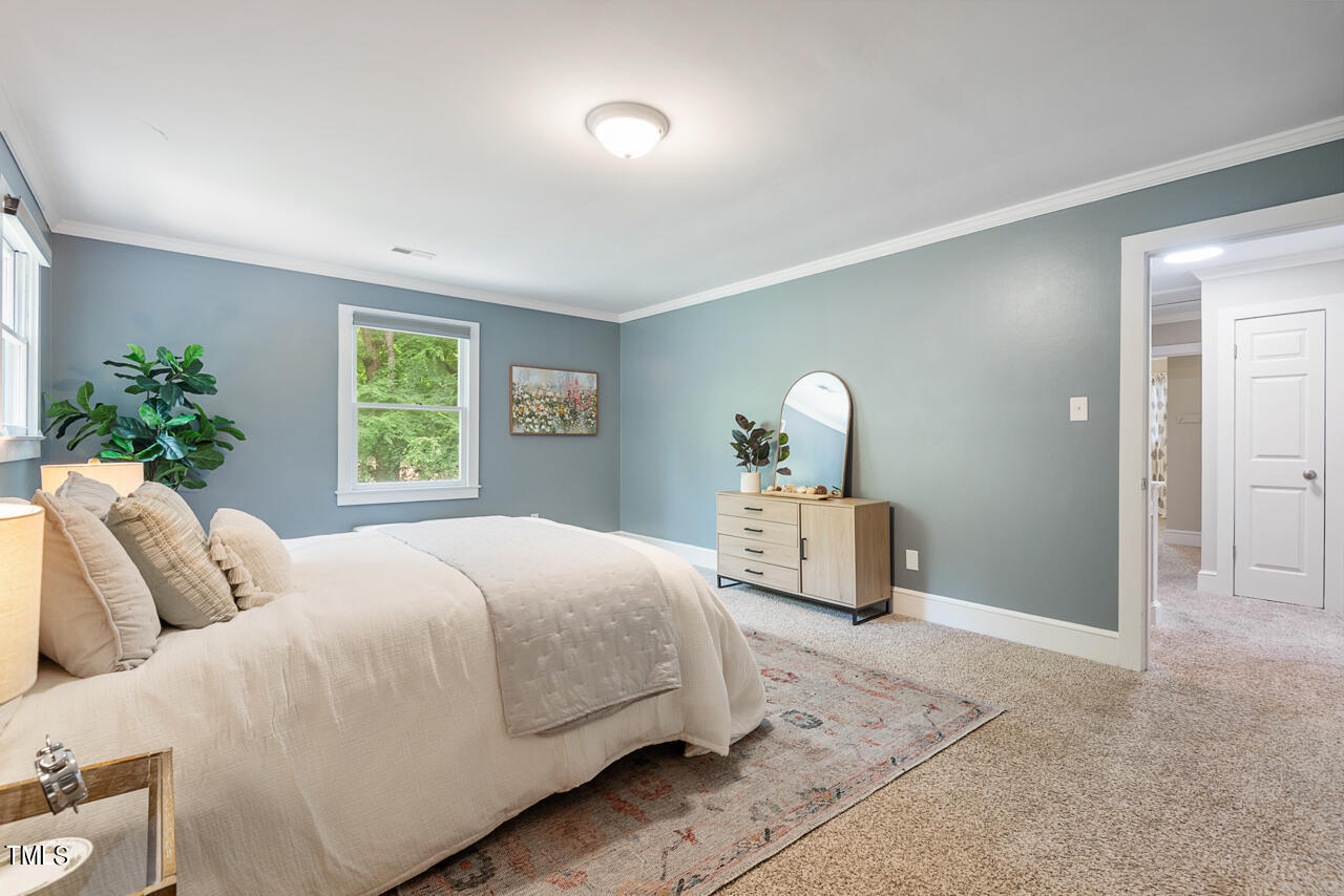 4102 Trotter Ridge Road Durham, NC 27707 - Photo 20 of 41 a bedroom with bed and window