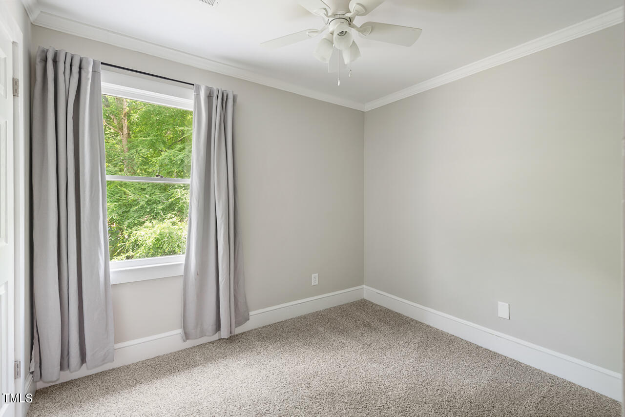 4102 Trotter Ridge Road Durham, NC 27707 - Photo 25 of 41 a view of an empty room with a window