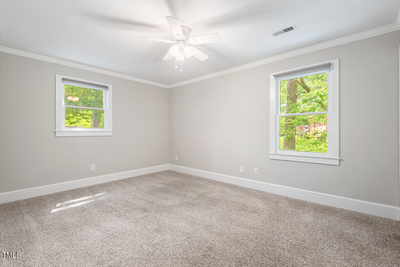 4102 Trotter Ridge Road Durham, NC 27707 - Photo 28 of 41 a view of an empty room with a window