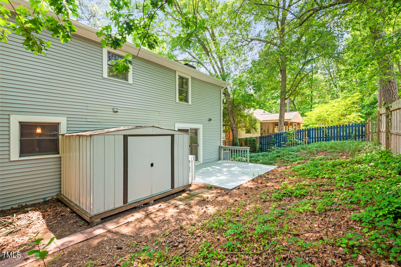 4102 Trotter Ridge Road Durham, NC 27707 - Photo 35 of 41 a view of a backyard with tree