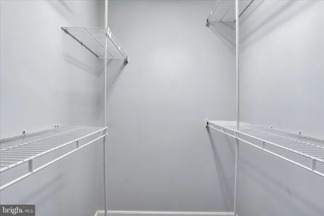 a view of a room with racks on the wall