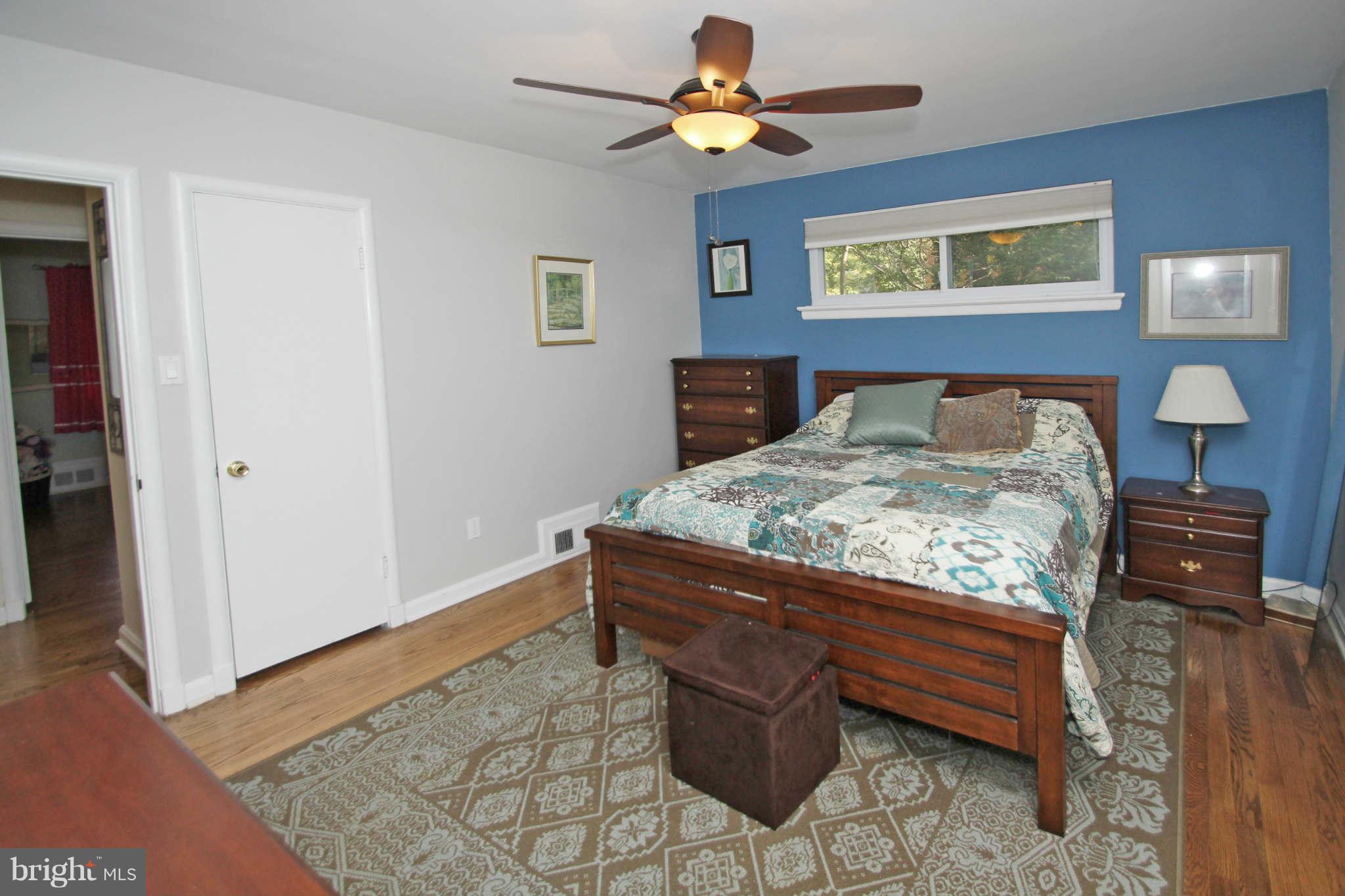 4 Oldham Road Silver Spring, MD 20901 - Photo 14 of 27 a bed sitting in a room next to a window