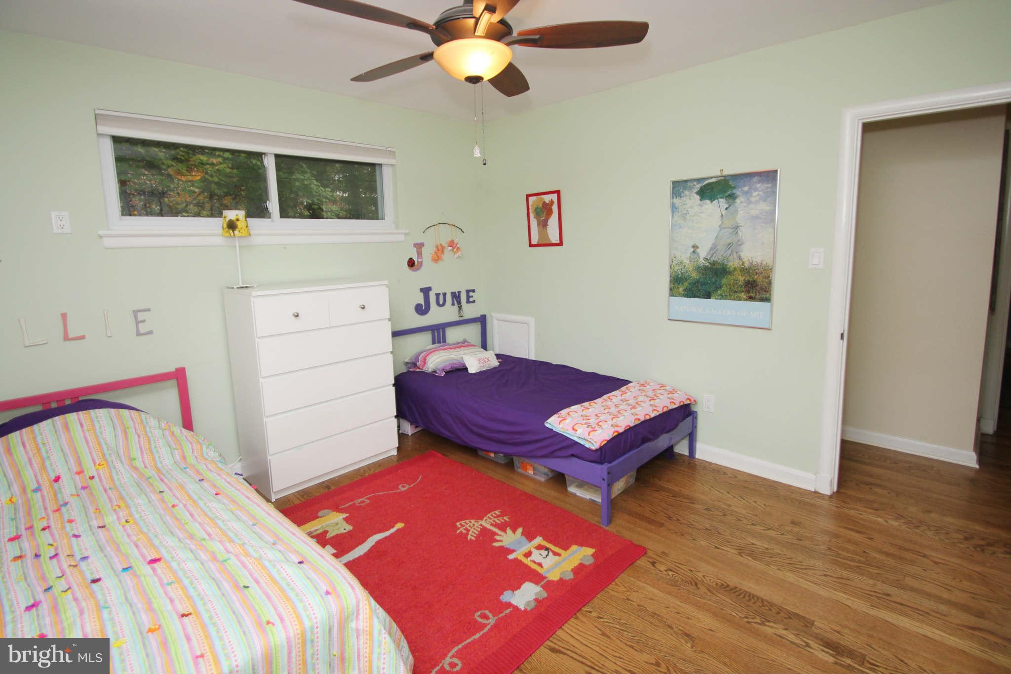 4 Oldham Road Silver Spring, MD 20901 - Photo 17 of 27 a bedroom with a bed and a dresser