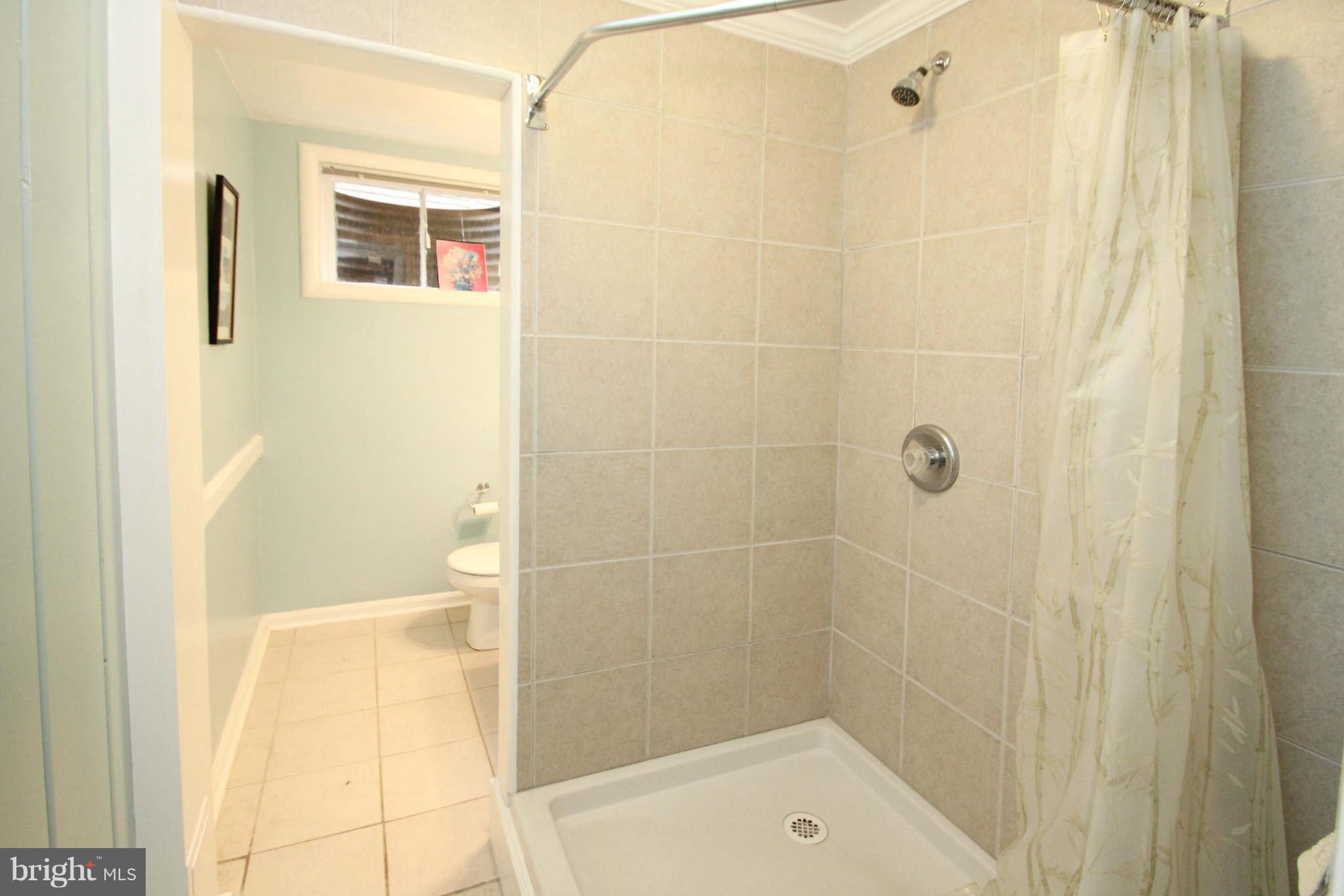 4 Oldham Road Silver Spring, MD 20901 - Photo 25 of 27 a bathroom with a shower
