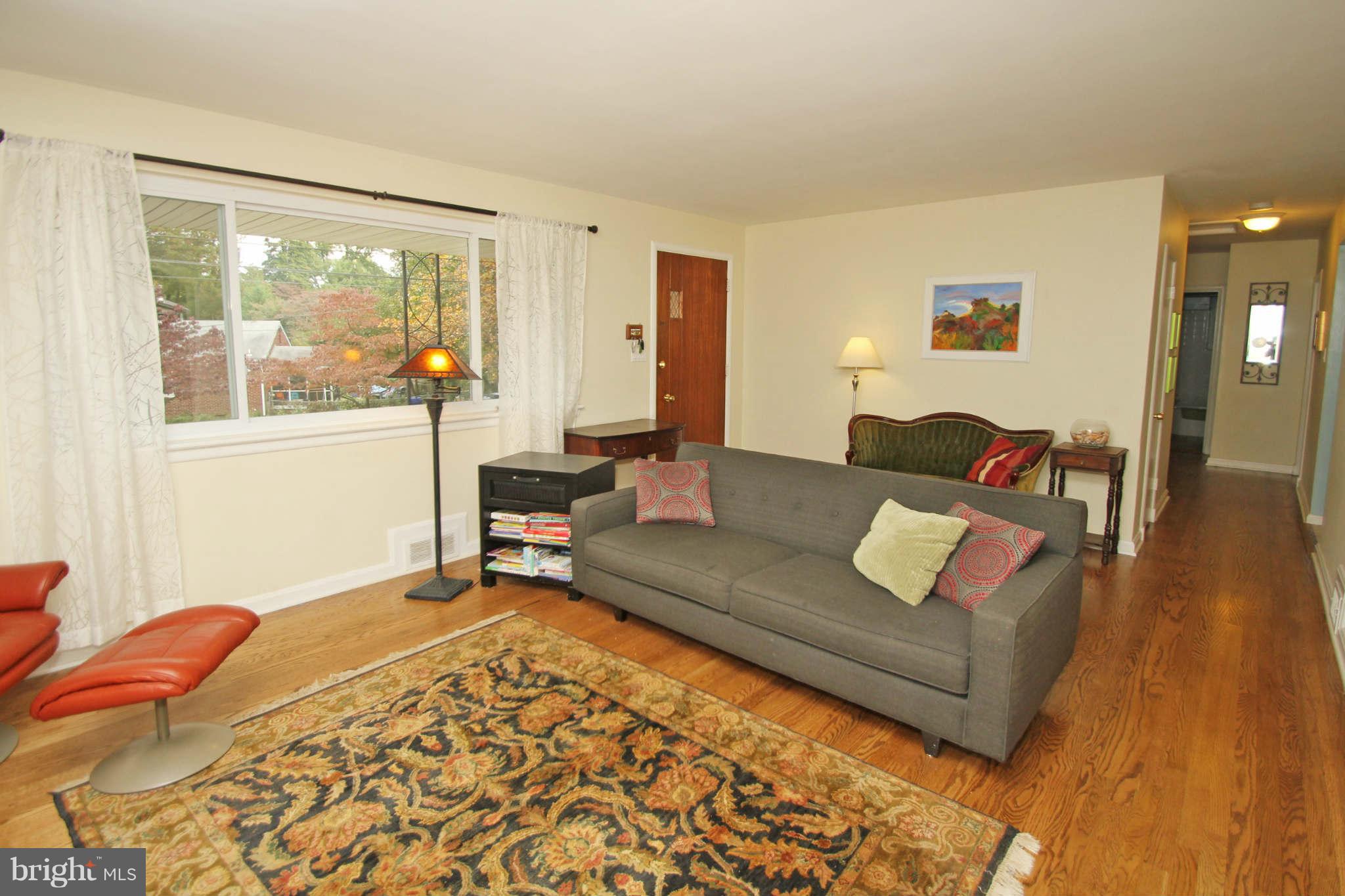4 Oldham Road Silver Spring, MD 20901 - Photo 6 of 27 a living room with furniture and a large window