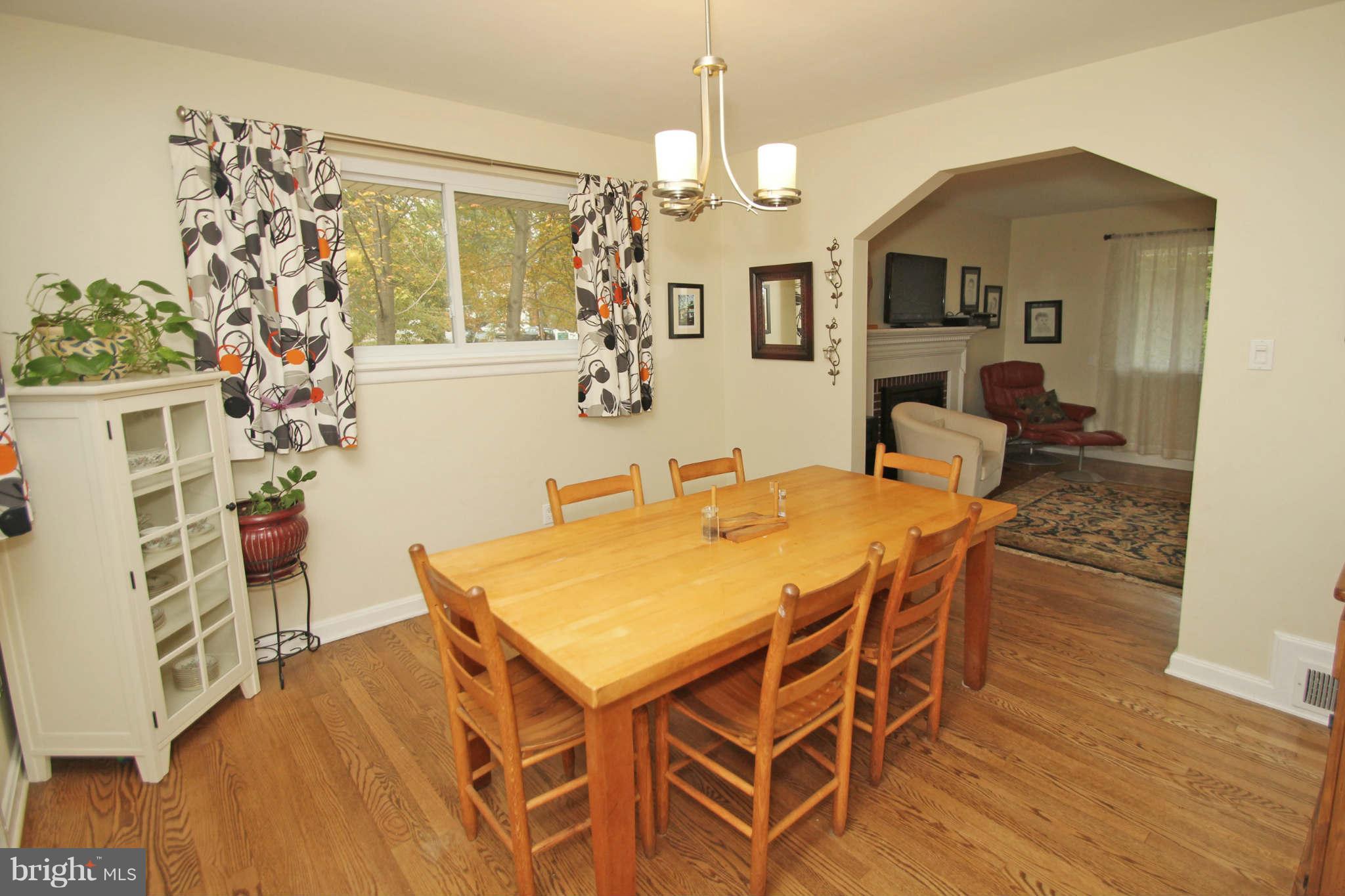 4 Oldham Road Silver Spring, MD 20901 - Photo 7 of 27 a view of a dining room with furniture and wooden floor