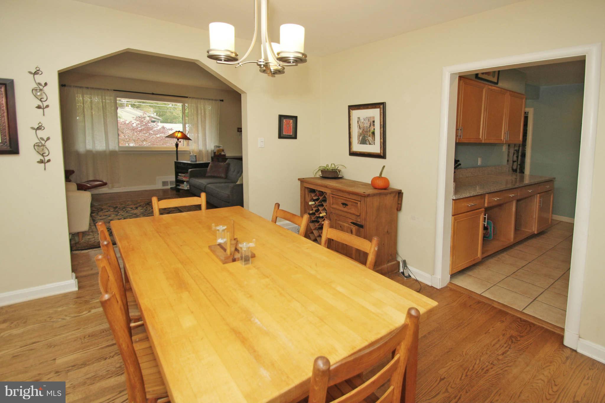 4 Oldham Road Silver Spring, MD 20901 - Photo 8 of 27 a room with table and chairs