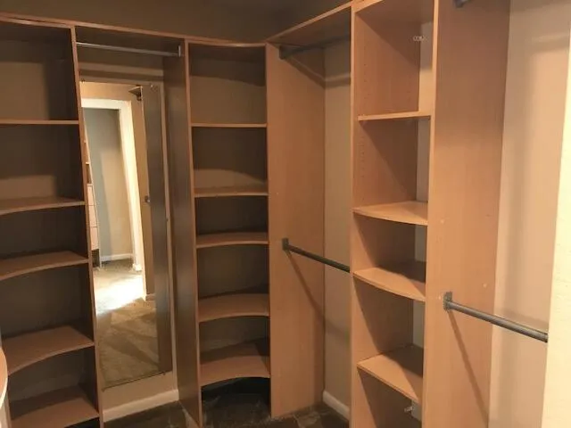 a table and chairs in front of a building