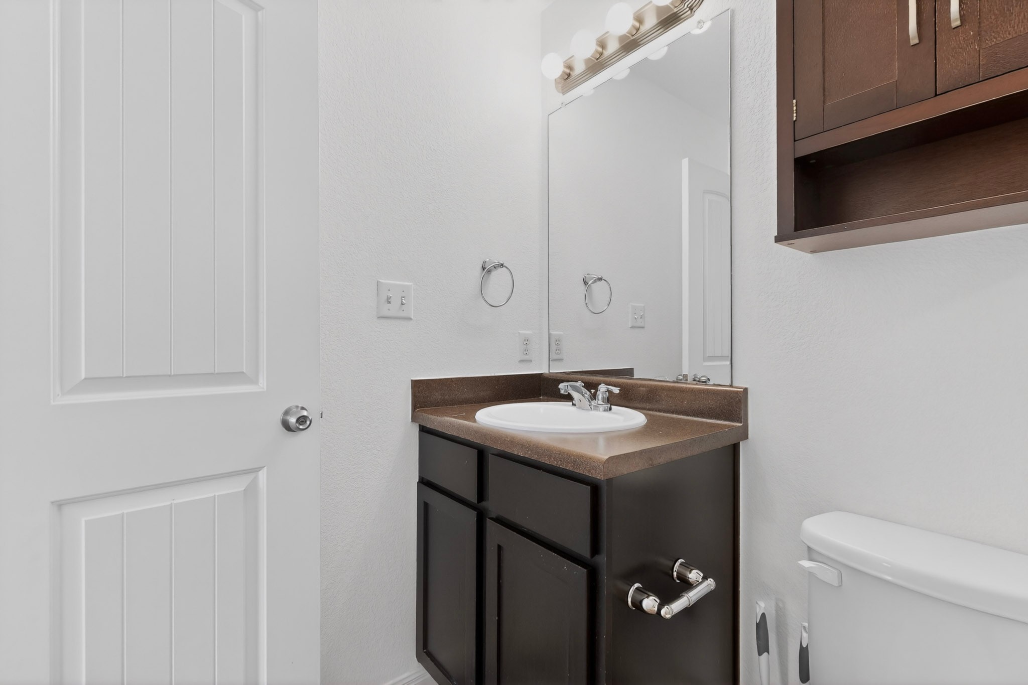 4619 Inicio Lane Austin, TX 78725 - Photo 20 of 32 a bathroom with a sink toilet and vanity