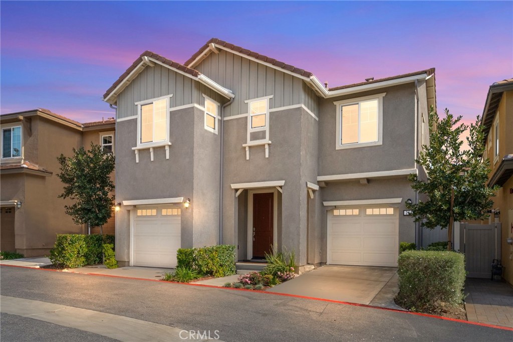 259 Spotted Saddle Way Fallbrook, CA 92028 - Photo 2 of 43 a front view of a house with garden