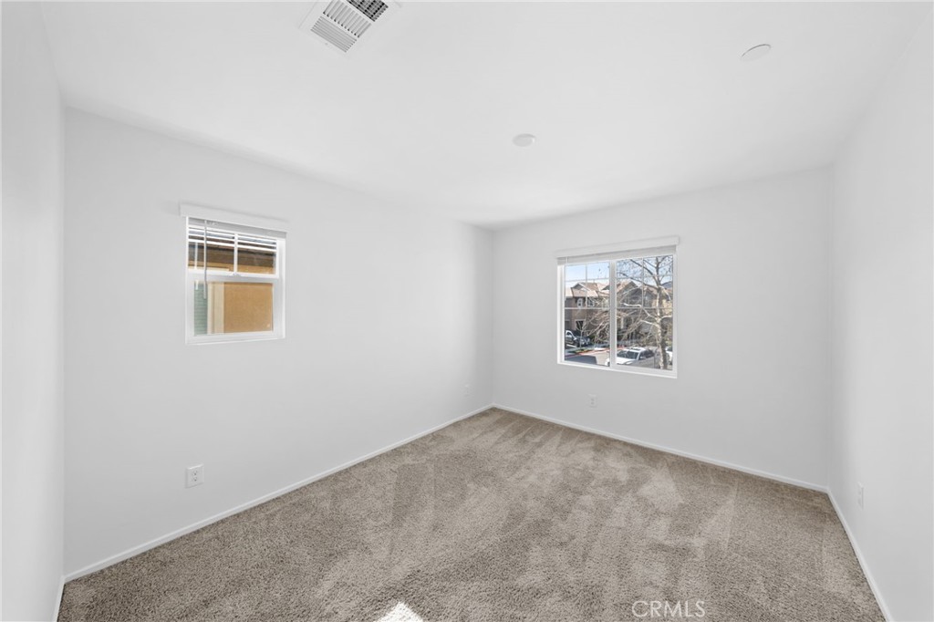 259 Spotted Saddle Way Fallbrook, CA 92028 - Photo 24 of 43 an empty room with a window