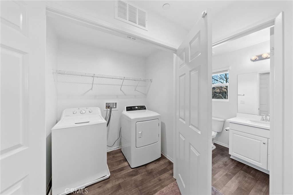 259 Spotted Saddle Way Fallbrook, CA 92028 - Photo 27 of 43 a view of a storage & utility room with a washer dryer